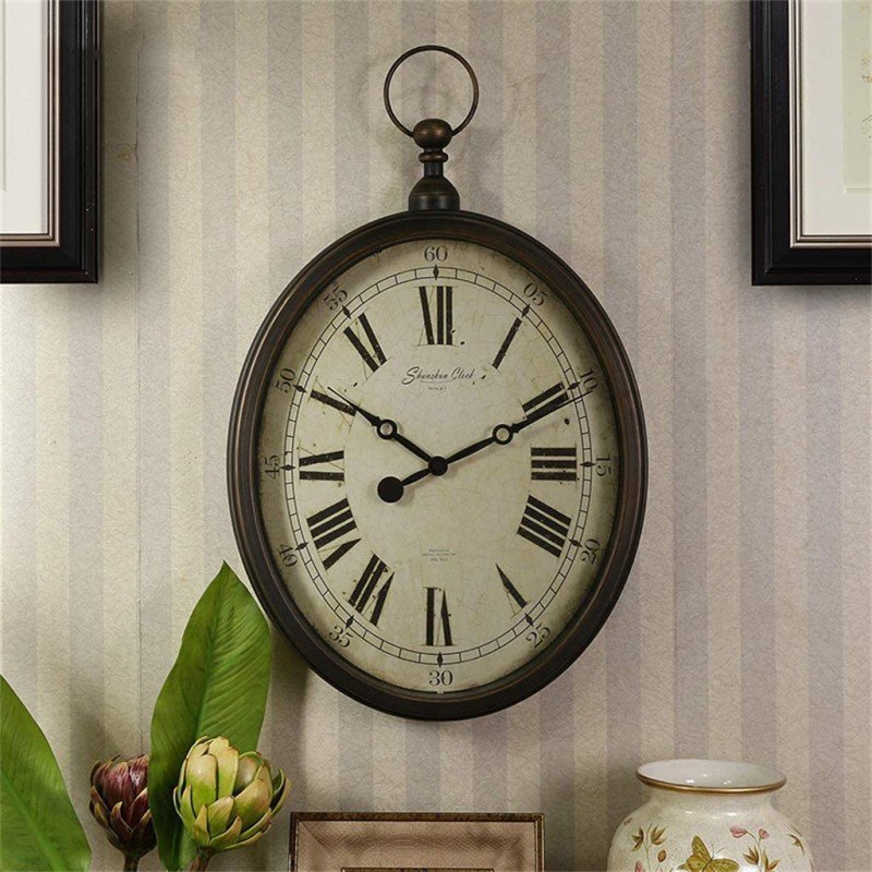 Oval antique rustic look wall clock