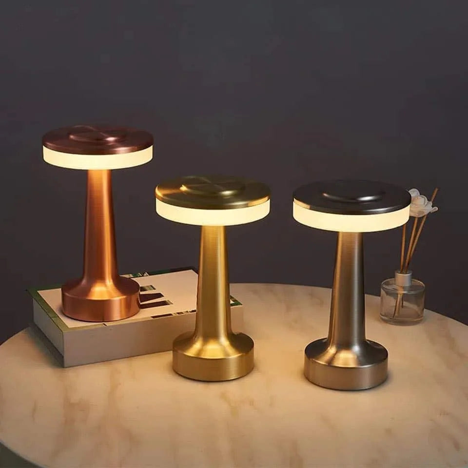 Hood-shaped rechargeable table lamp