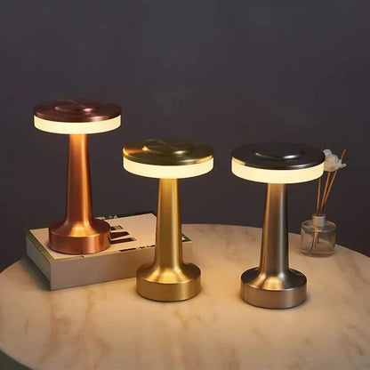Hood-shaped rechargeable table lamp